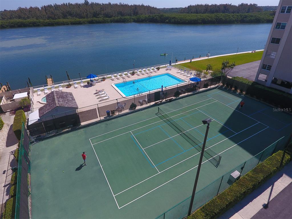 9397 Midnight Pass Road, Unit 501 Sarasota, FL 34242 - Photo 45 of 45 a view of a lake with a mountain