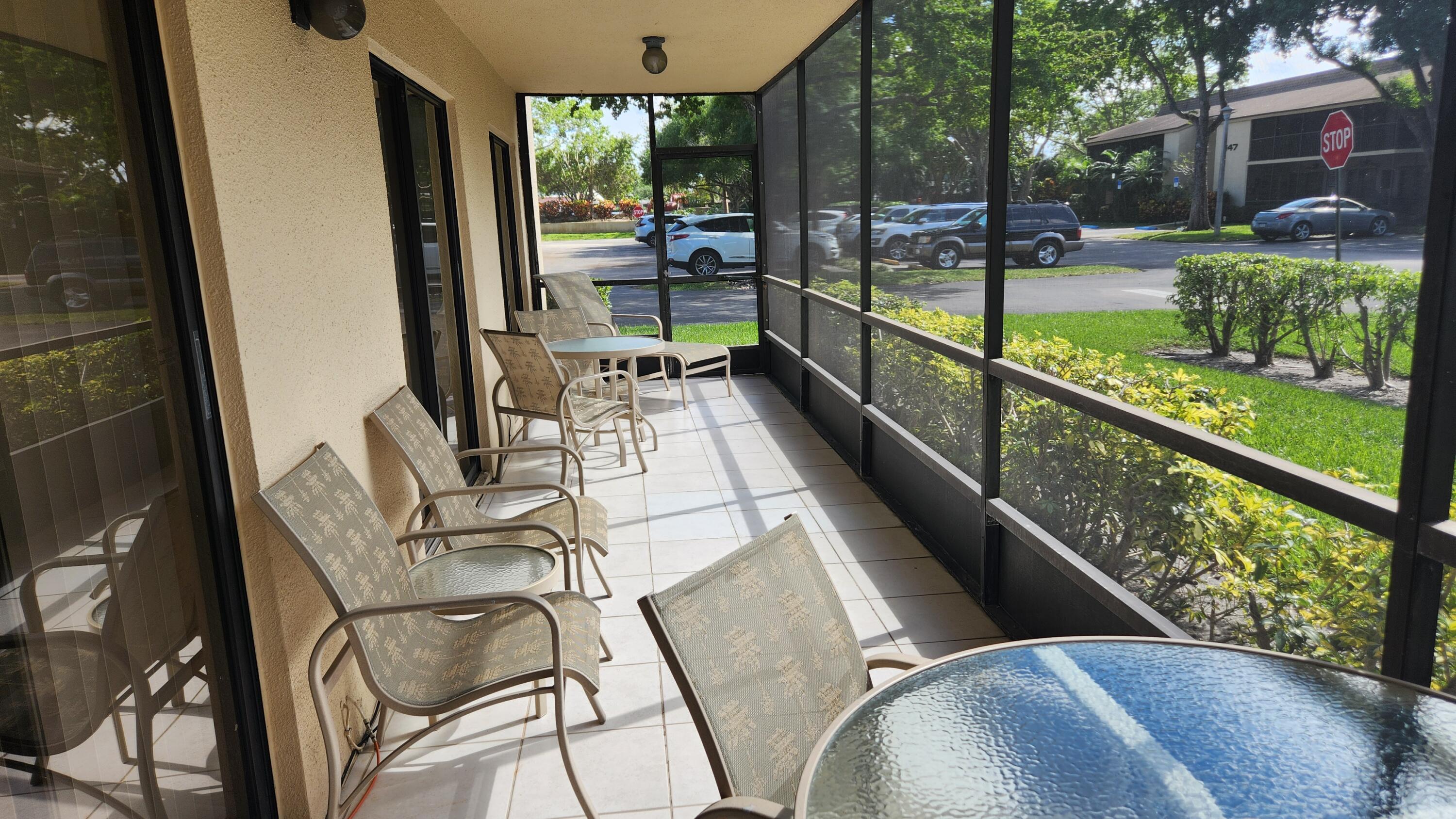 171 Deer Creek Boulevard, Unit 701 Deerfield Beach, FL 33442 - Photo 19 of 23 a view of balcony with a patio