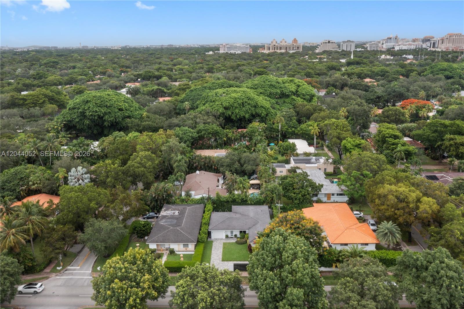 721 Bird Road Coral Gables, FL 33146 - Photo 23 of 24 an aerial view of residential houses with outdoor space and trees