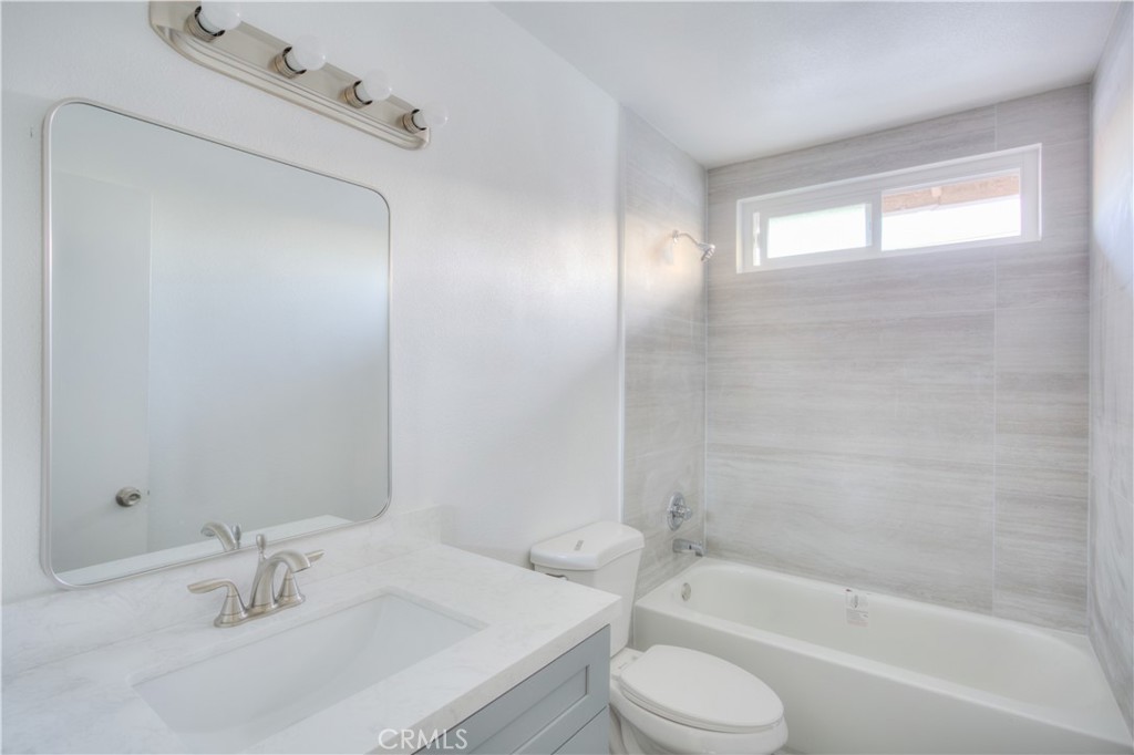 154 South Linda Way, Unit C Upland, CA 91786 - Photo 17 of 21 a bathroom with a sink toilet and shower