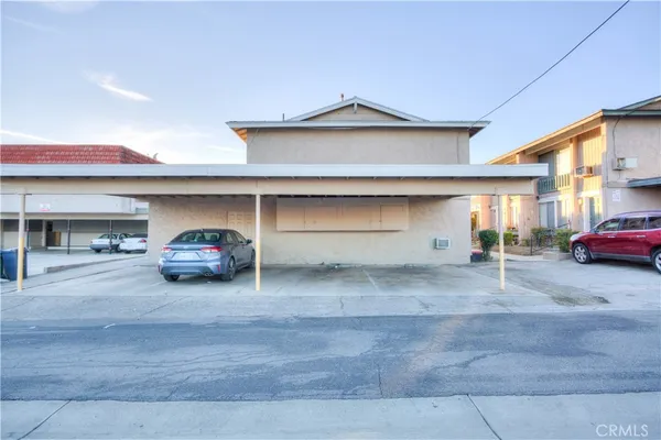a car parked in front of garage