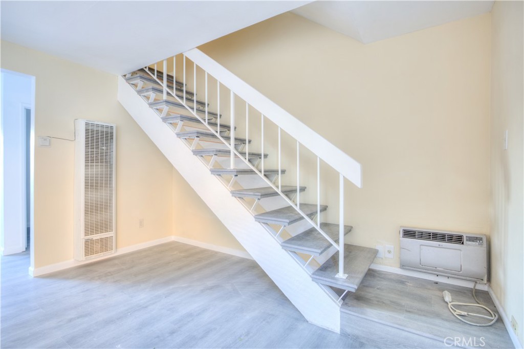 154 South Linda Way, Unit C Upland, CA 91786 - Photo 5 of 21 a view of entryway and hall with wooden floor