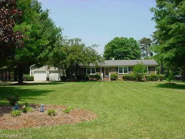 7910 Alcorn Road Oak Ridge, NC 27310 - Photo 1 of 8 Exterior Front.