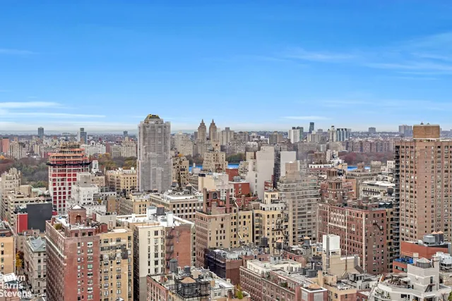 a view of a city with tall buildings