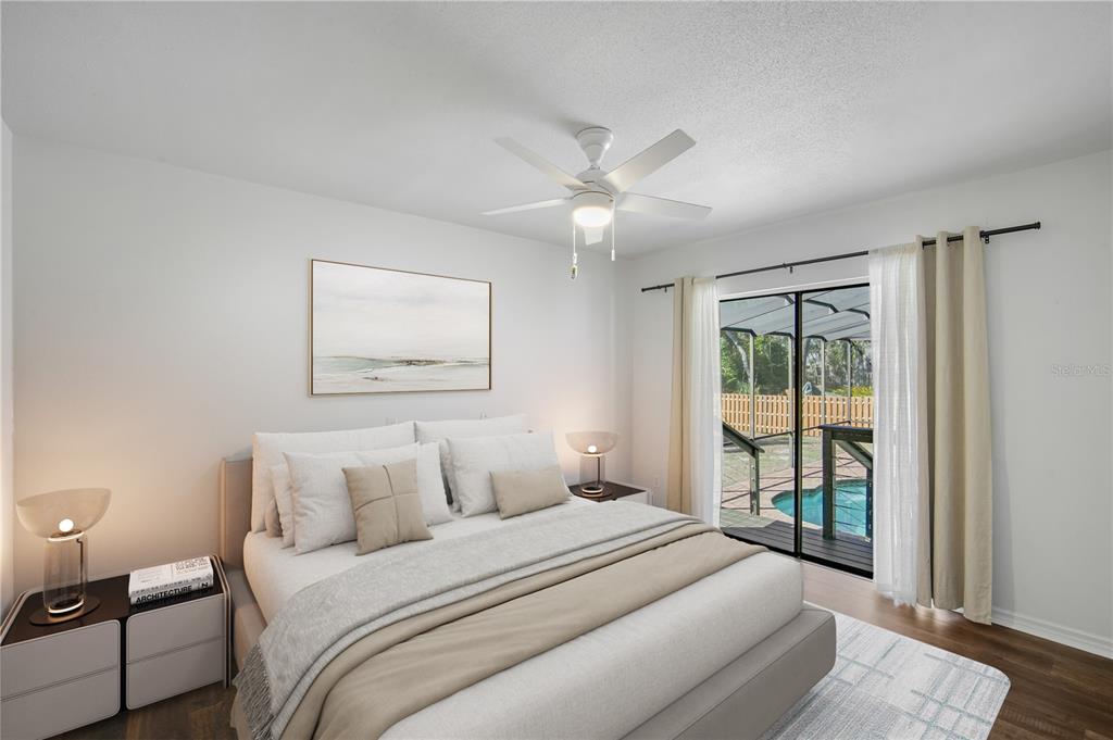 109 Holly Tree Lane Brandon, FL 33511 - Photo 24 of 31 a bedroom with a large bed and a window