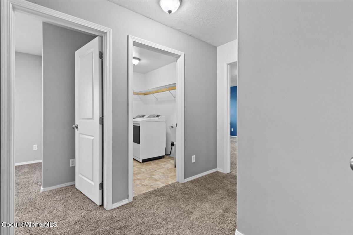 3483 West Lotze Loop Coeur D'Alene, ID 83815 - Photo 15 of 56 Upstairs looking into Laundry room