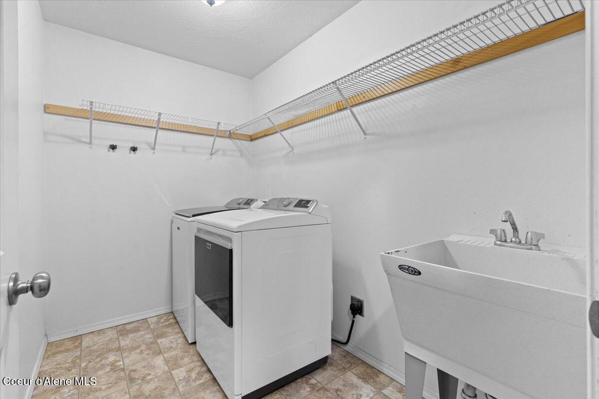 3483 West Lotze Loop Coeur D'Alene, ID 83815 - Photo 16 of 56 Laundry room withlarge utility sink