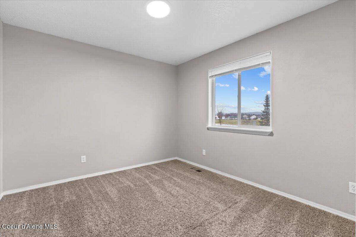 3483 West Lotze Loop Coeur D'Alene, ID 83815 - Photo 26 of 56 Upstairs bedroom