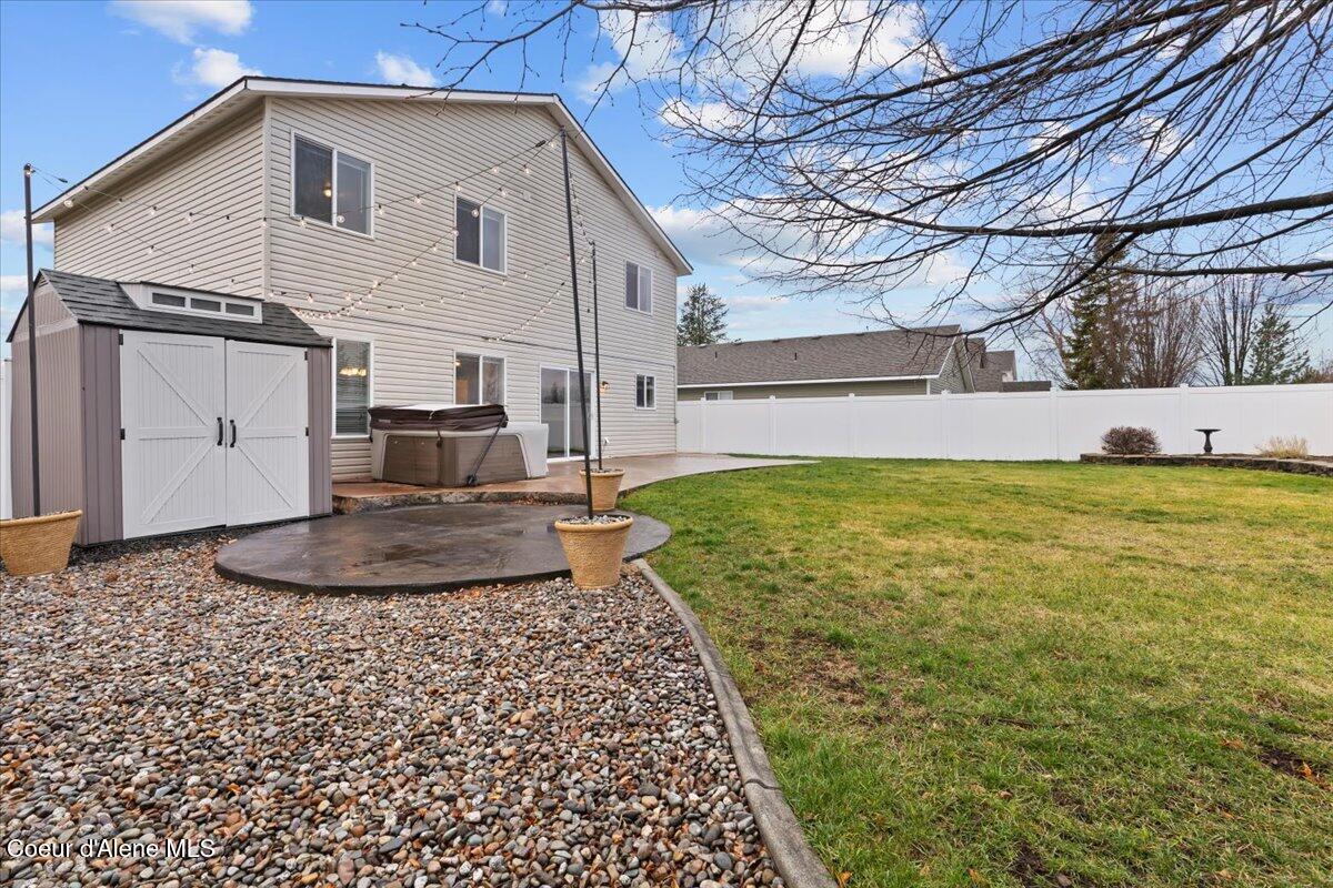 3483 West Lotze Loop Coeur D'Alene, ID 83815 - Photo 36 of 56 Firepit area and garden shed