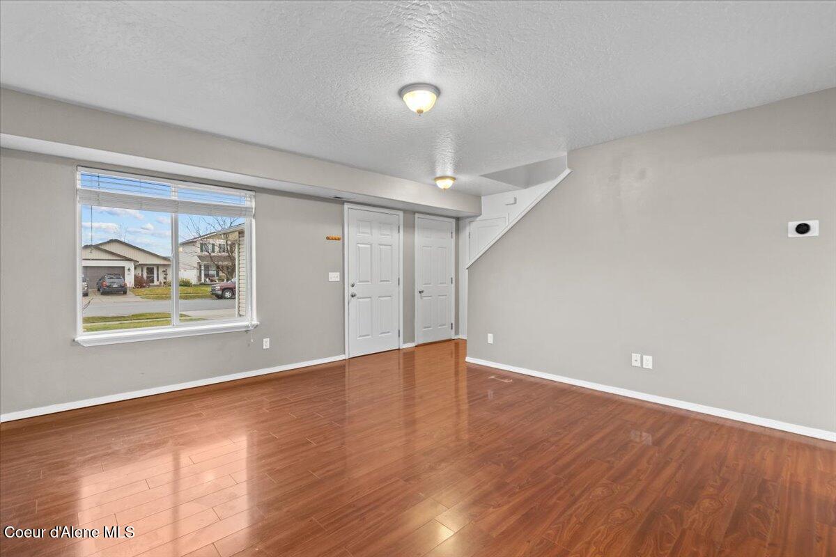 3483 West Lotze Loop Coeur D'Alene, ID 83815 - Photo 4 of 56 Living room looking toward front door l