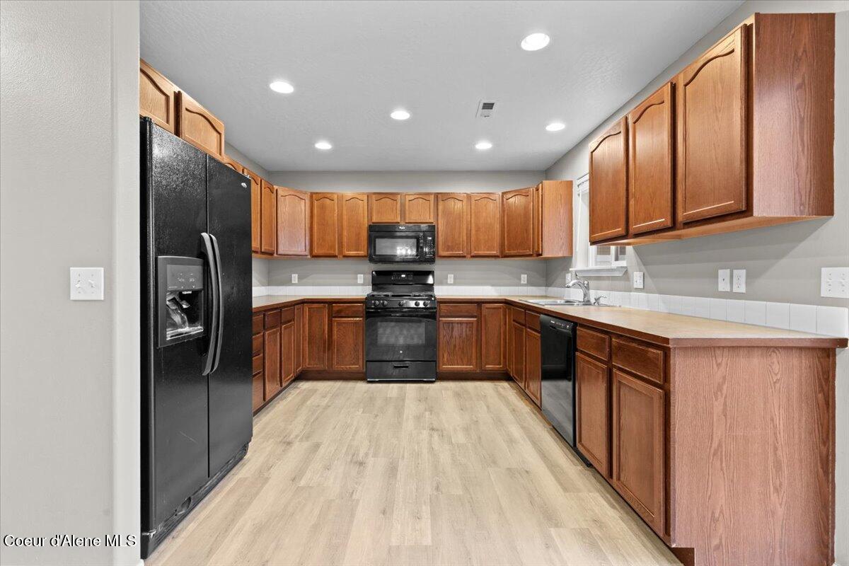 3483 West Lotze Loop Coeur D'Alene, ID 83815 - Photo 7 of 56 Kitchen with new LVP flooring