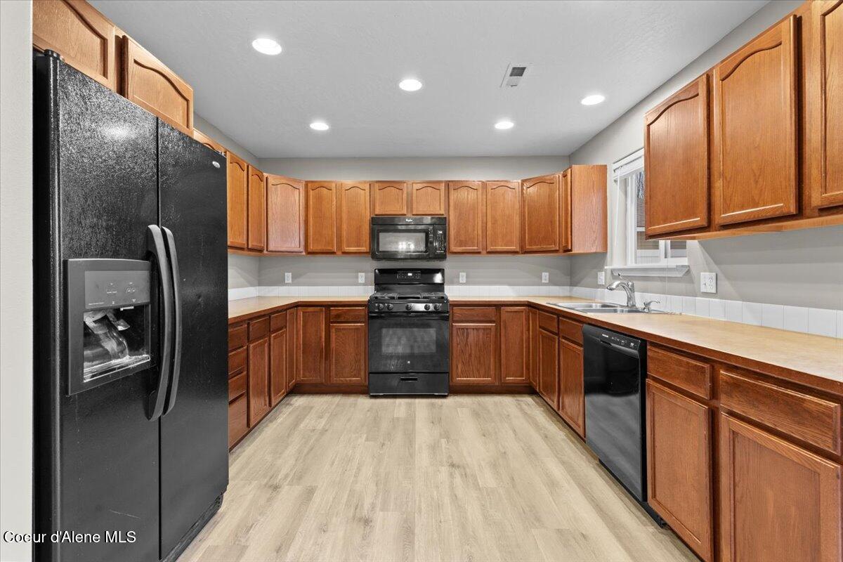 3483 West Lotze Loop Coeur D'Alene, ID 83815 - Photo 9 of 56 Lots of cabinets in kitchen