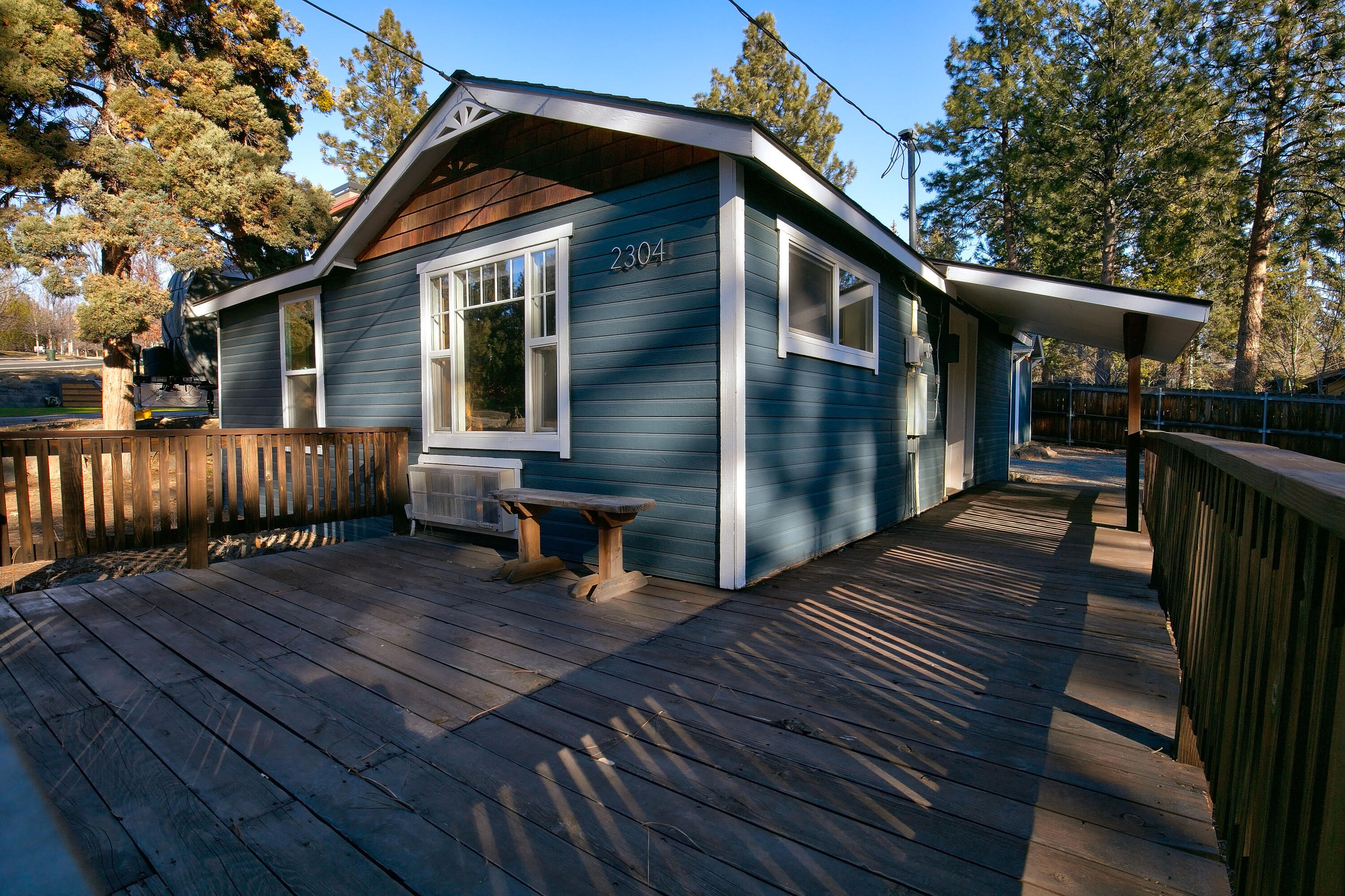 2304 Northwest Awbrey Road Bend, OR 97703 - Photo 14 of 21 a view of backyard with deck and wooden floor