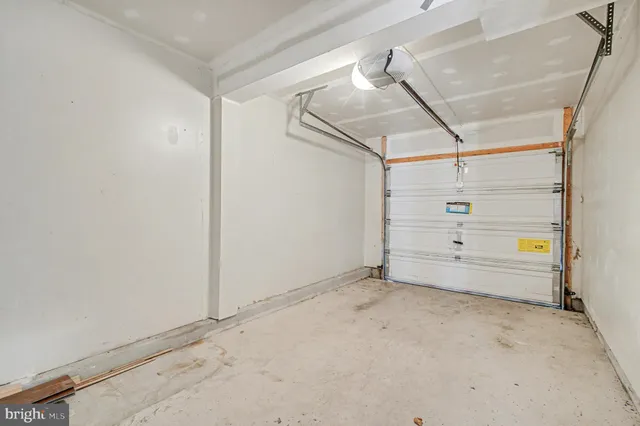 a view of garage and utility room