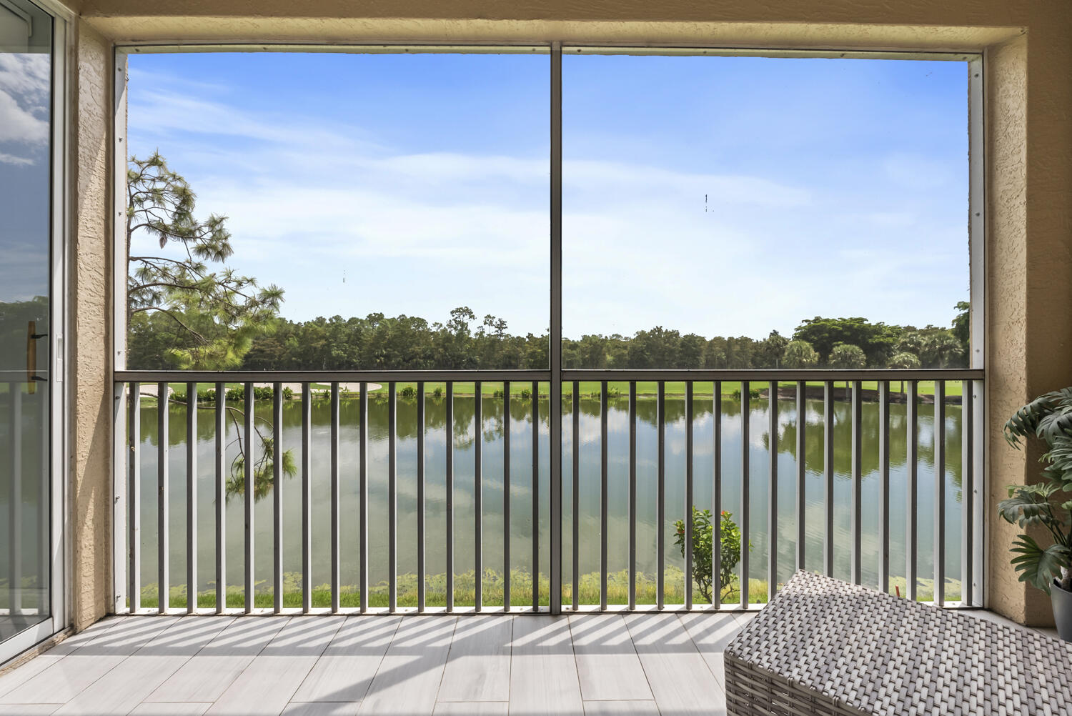 3780 Sawgrass Way, Unit 3325 Naples, FL 34112 - Photo 27 of 49 a balcony with lake view