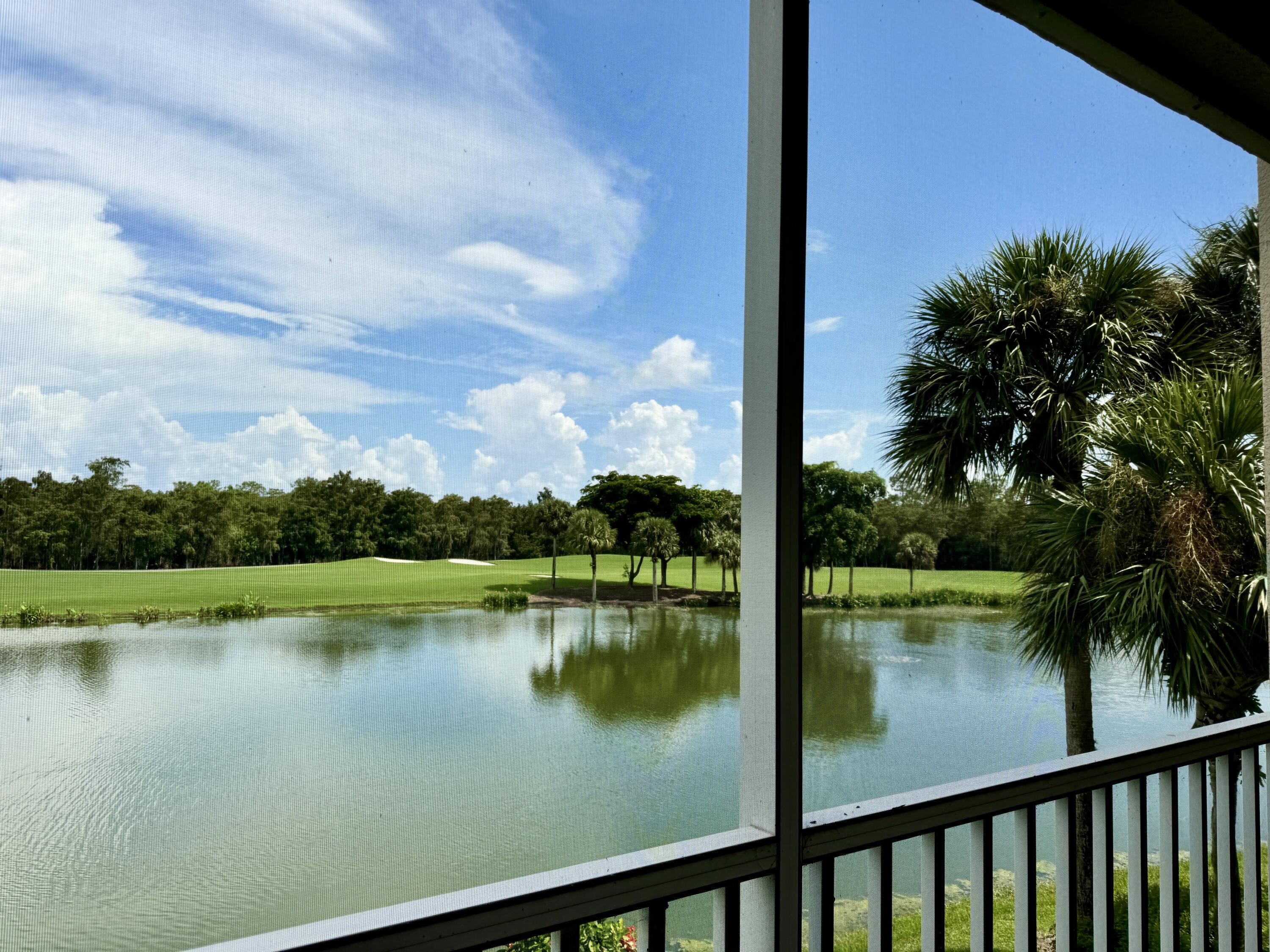 3780 Sawgrass Way, Unit 3325 Naples, FL 34112 - Photo 3 of 49 a view of lake from a balcony