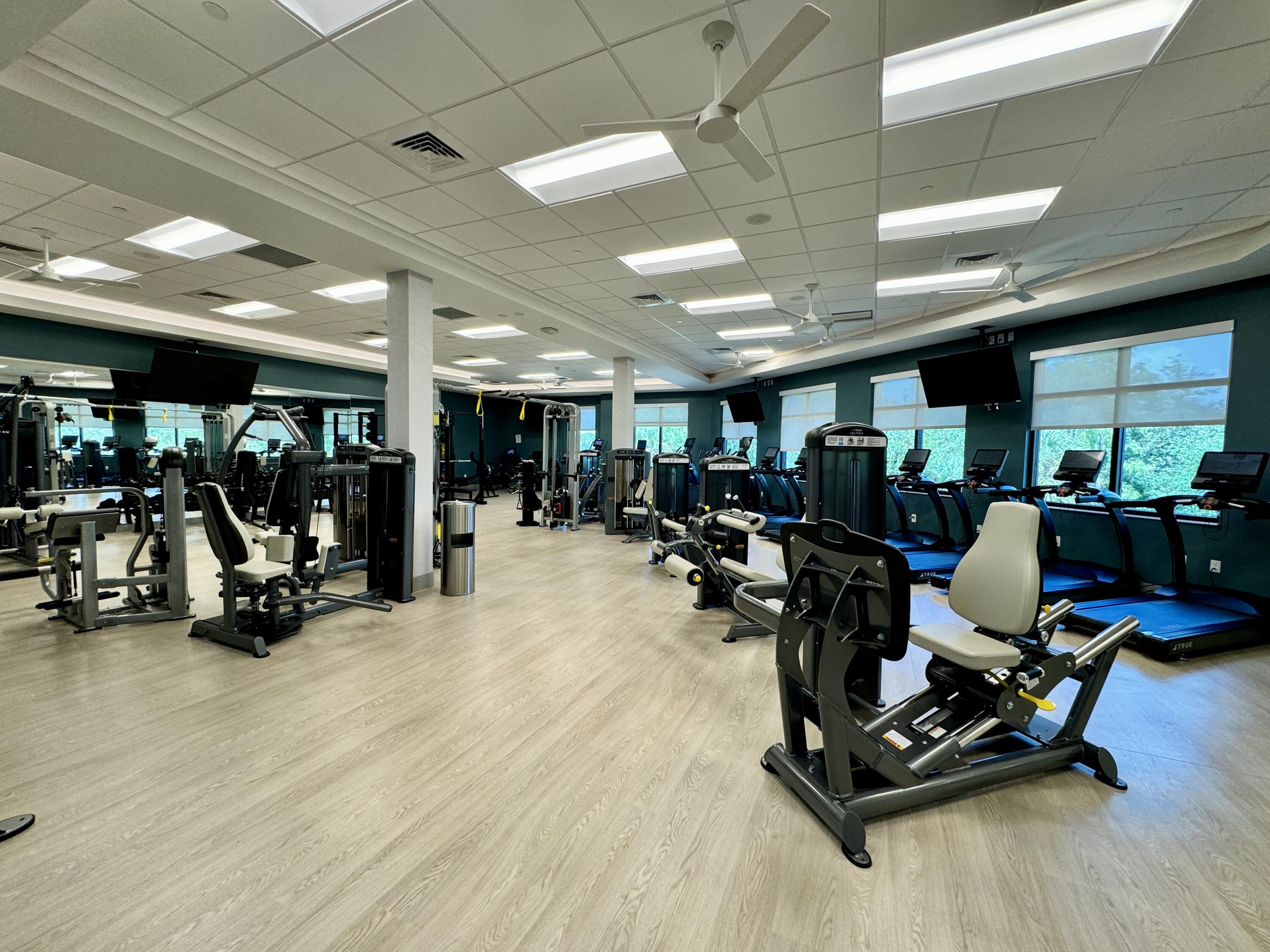 3780 Sawgrass Way, Unit 3325 Naples, FL 34112 - Photo 47 of 49 a view of a room with gym equipment