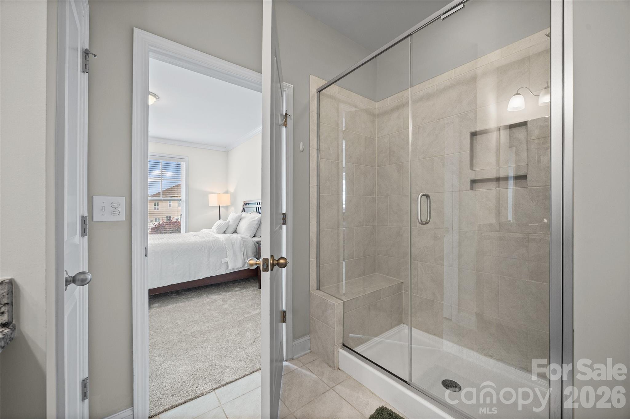 979 Pennington Drive Lancaster, SC 29720 - Photo 16 of 47 a en suite bathroom with a shower