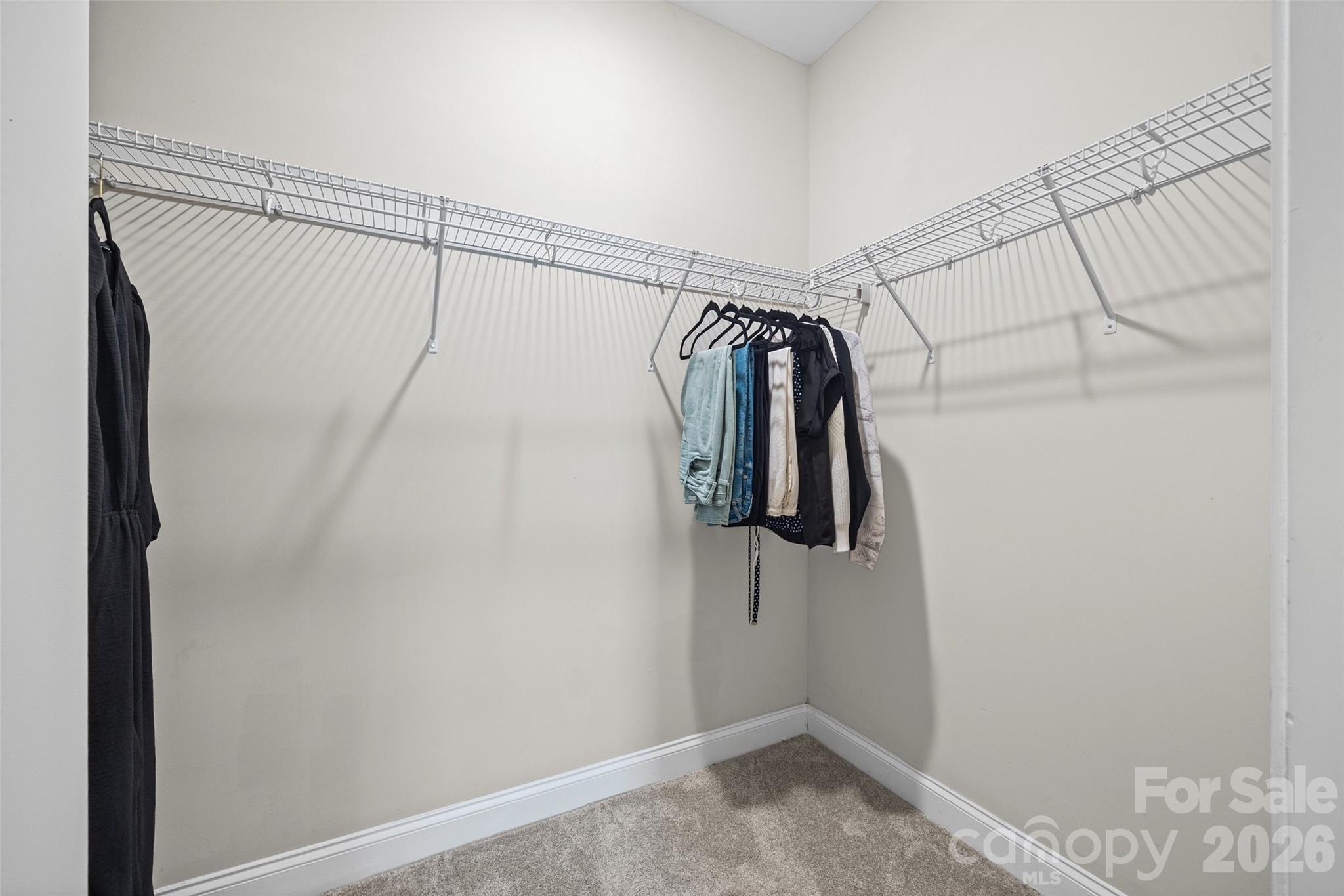 979 Pennington Drive Lancaster, SC 29720 - Photo 17 of 47 a view of walk in closet with clothes and white walls
