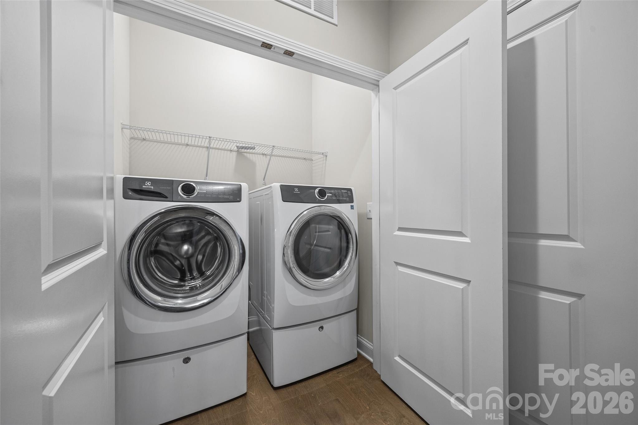 979 Pennington Drive Lancaster, SC 29720 - Photo 19 of 47 a utility room with sink dryer and washer