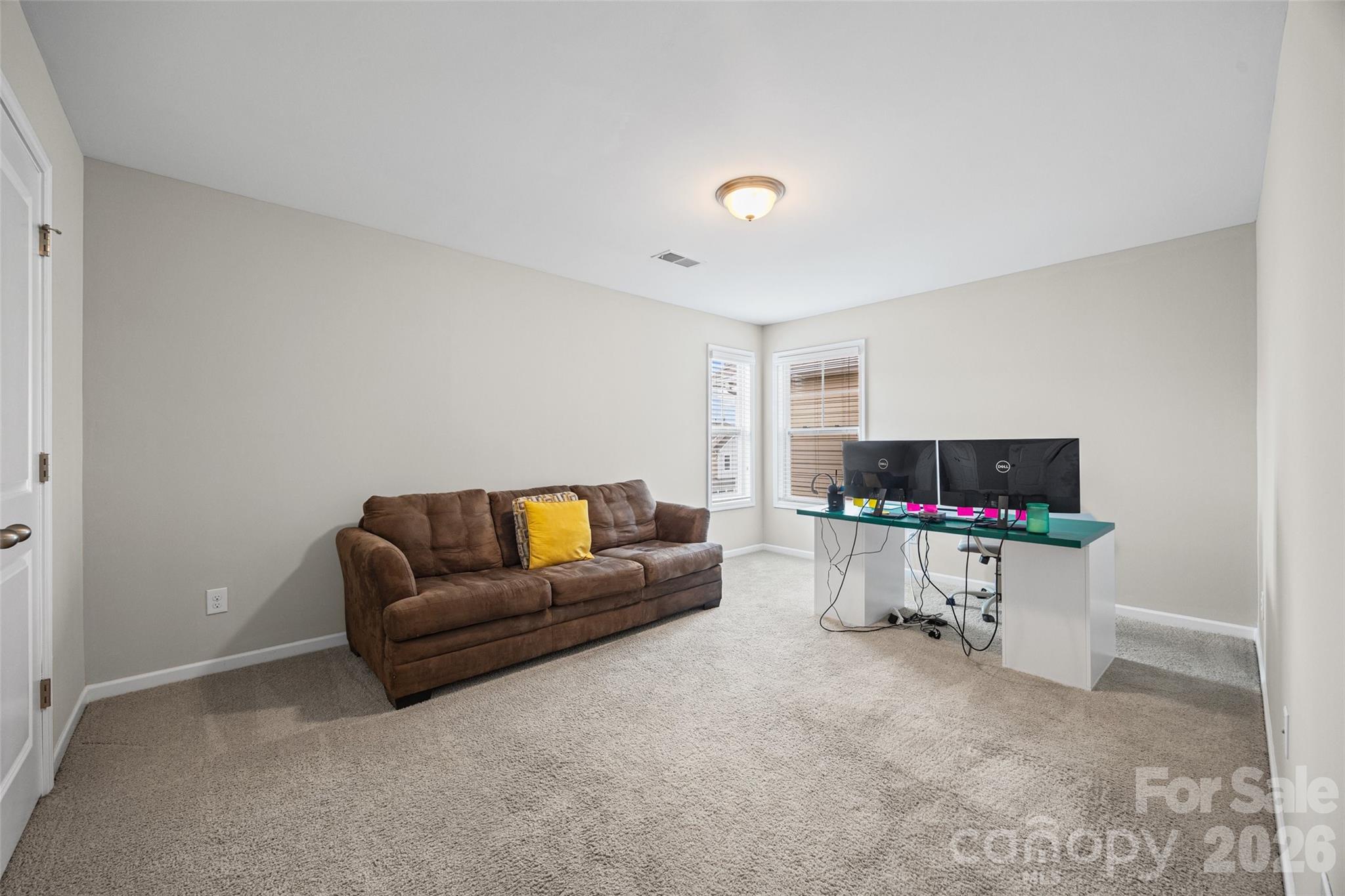 979 Pennington Drive Lancaster, SC 29720 - Photo 23 of 47 a living room with furniture and a flat screen tv