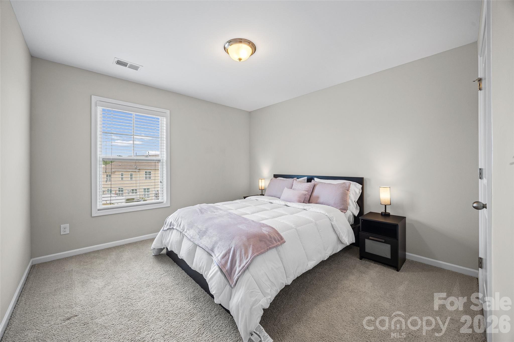 979 Pennington Drive Lancaster, SC 29720 - Photo 25 of 47 a bedroom with a bed and a window
