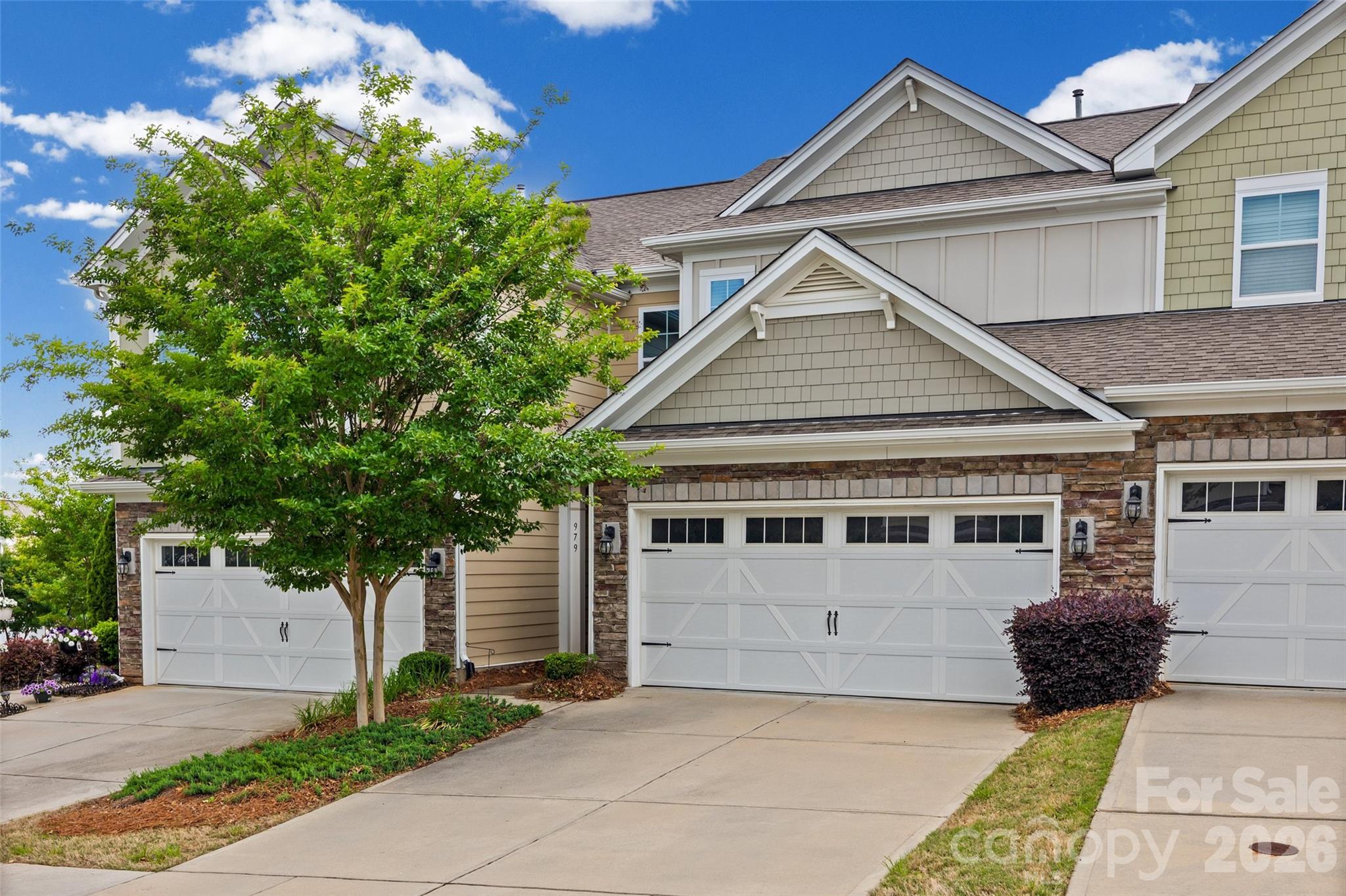 979 Pennington Drive Lancaster, SC 29720 - Photo 28 of 47 a view of house with a yard and a garage