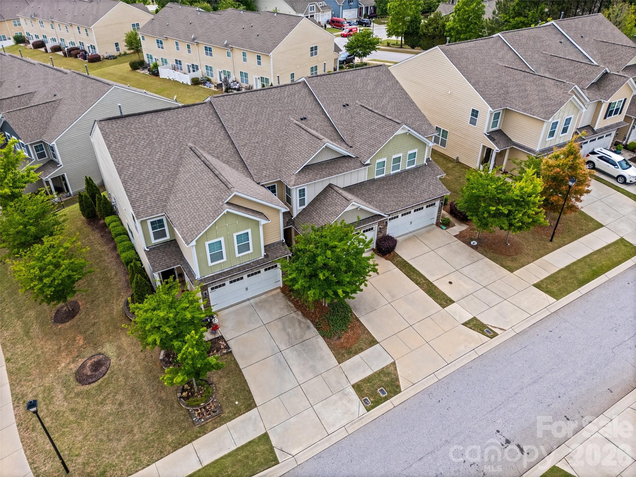 979 Pennington Drive Lancaster, SC 29720 - Photo 29 of 47 an aerial view of multiple houses with a yard