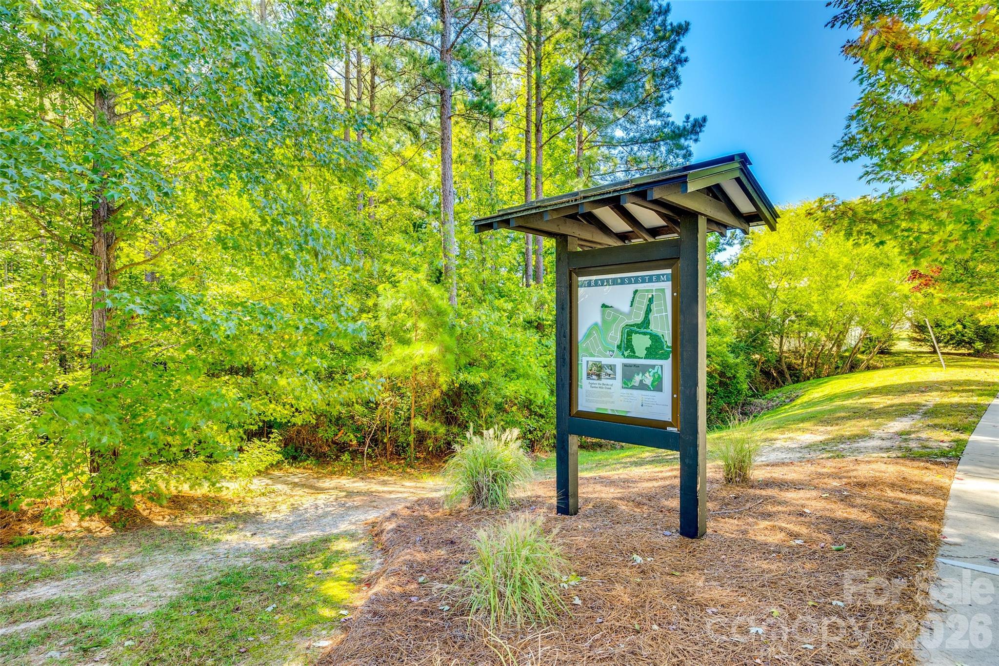 979 Pennington Drive Lancaster, SC 29720 - Photo 41 of 47 a small pool with a trees in the background