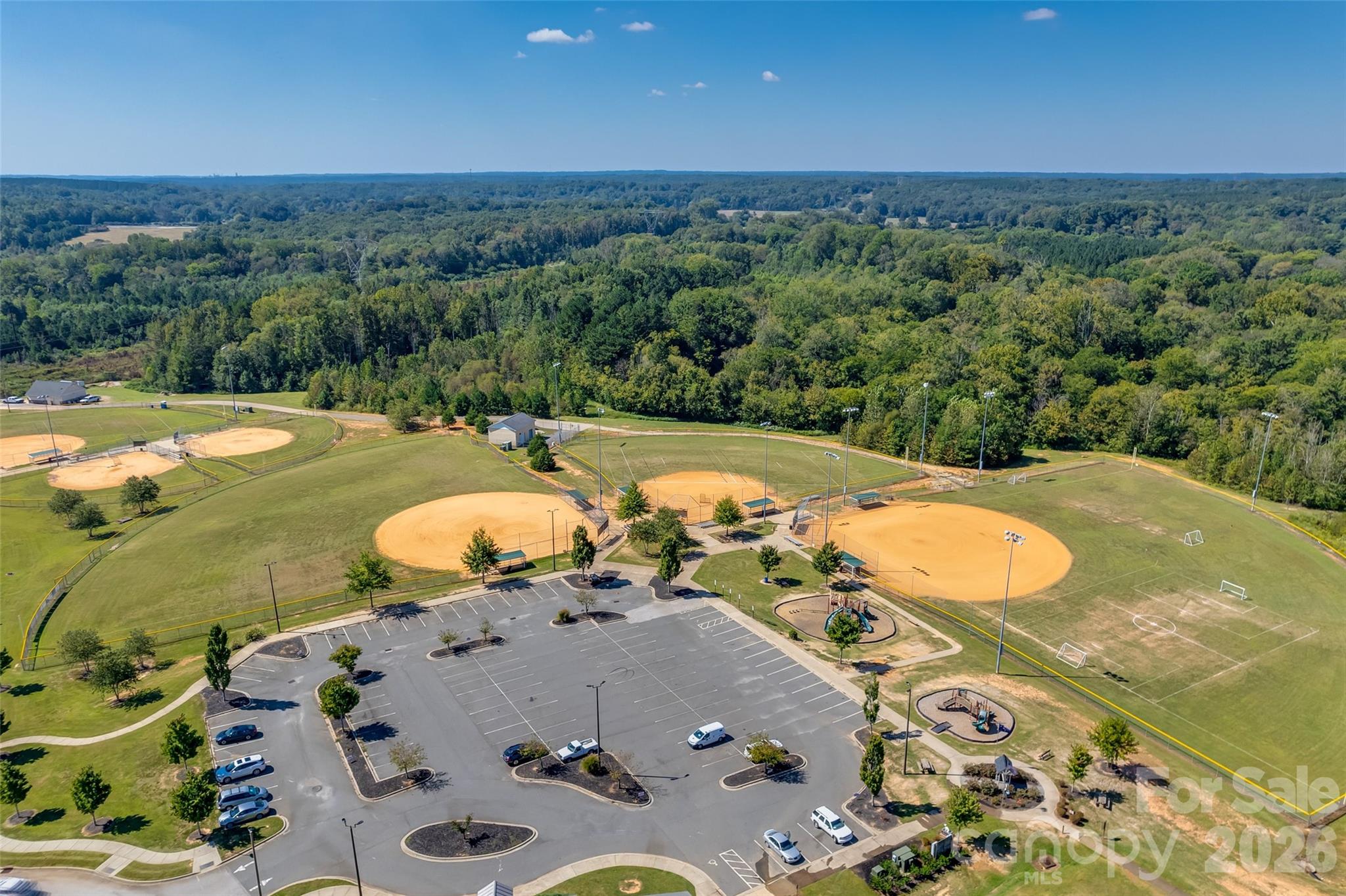 979 Pennington Drive Lancaster, SC 29720 - Photo 46 of 47 an aerial view of a swimming pool with a yard