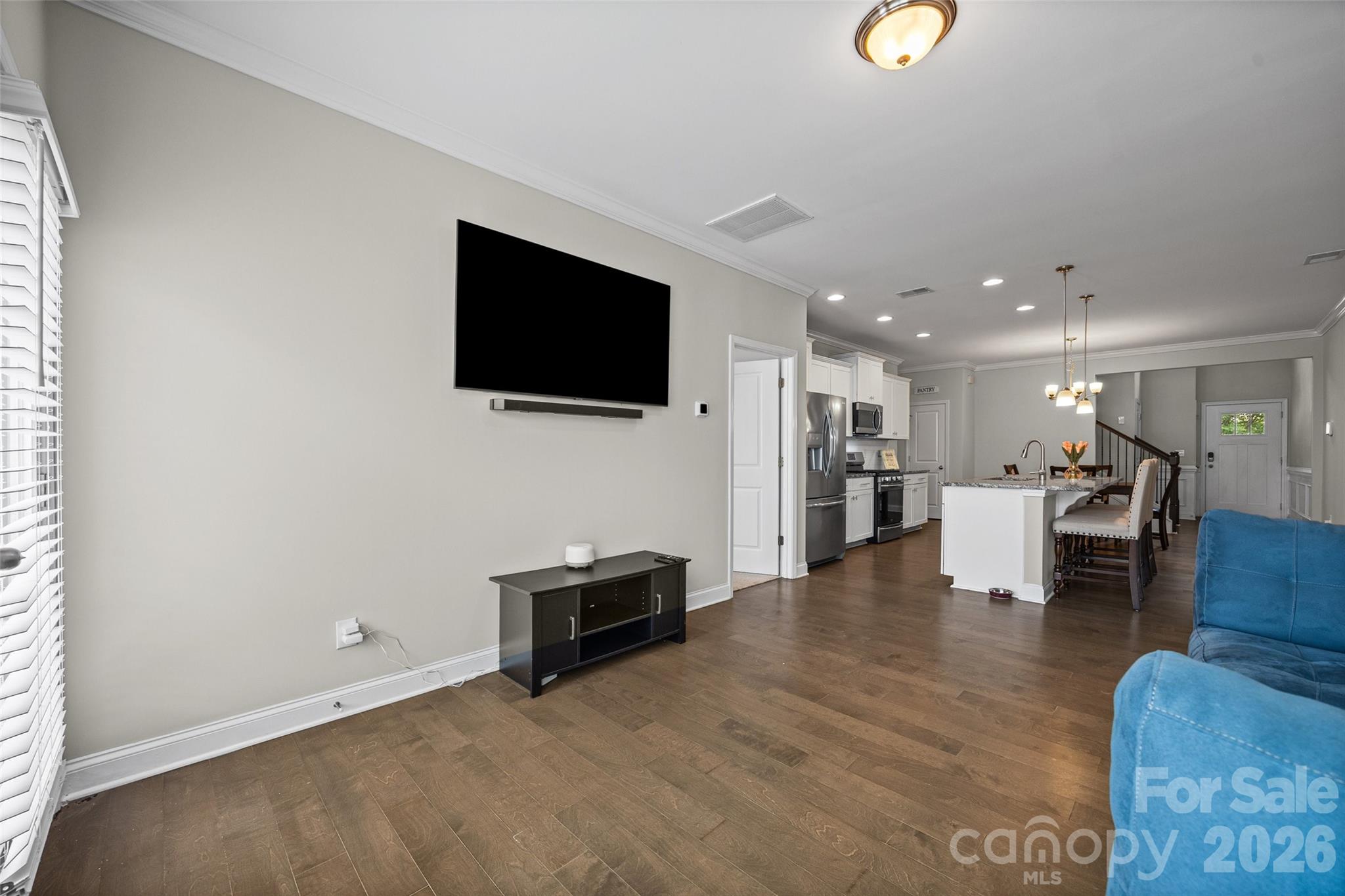 979 Pennington Drive Lancaster, SC 29720 - Photo 6 of 47 a living room with furniture and a flat screen tv