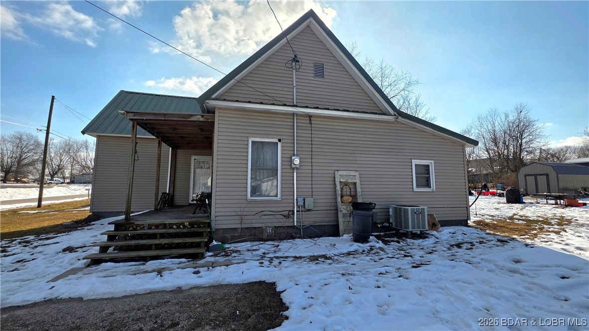 405 South Walnut Street Versailles, MO 65084 - Photo 26 of 28 Sideview of home