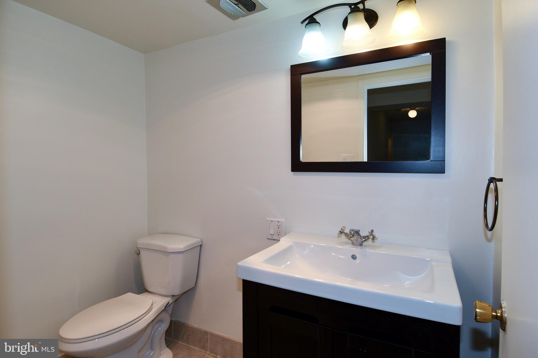 2113 Bucknell Terrace, Unit 50 Silver Spring, MD 20902 - Photo 28 of 37 Lower Level Half Bath