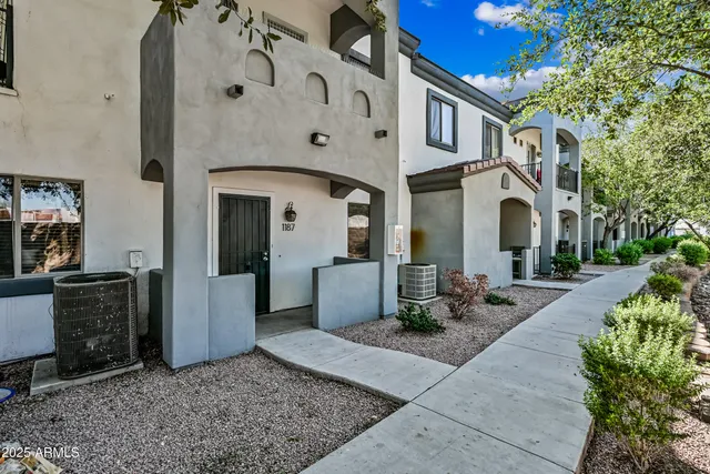 a front view of a house with patio