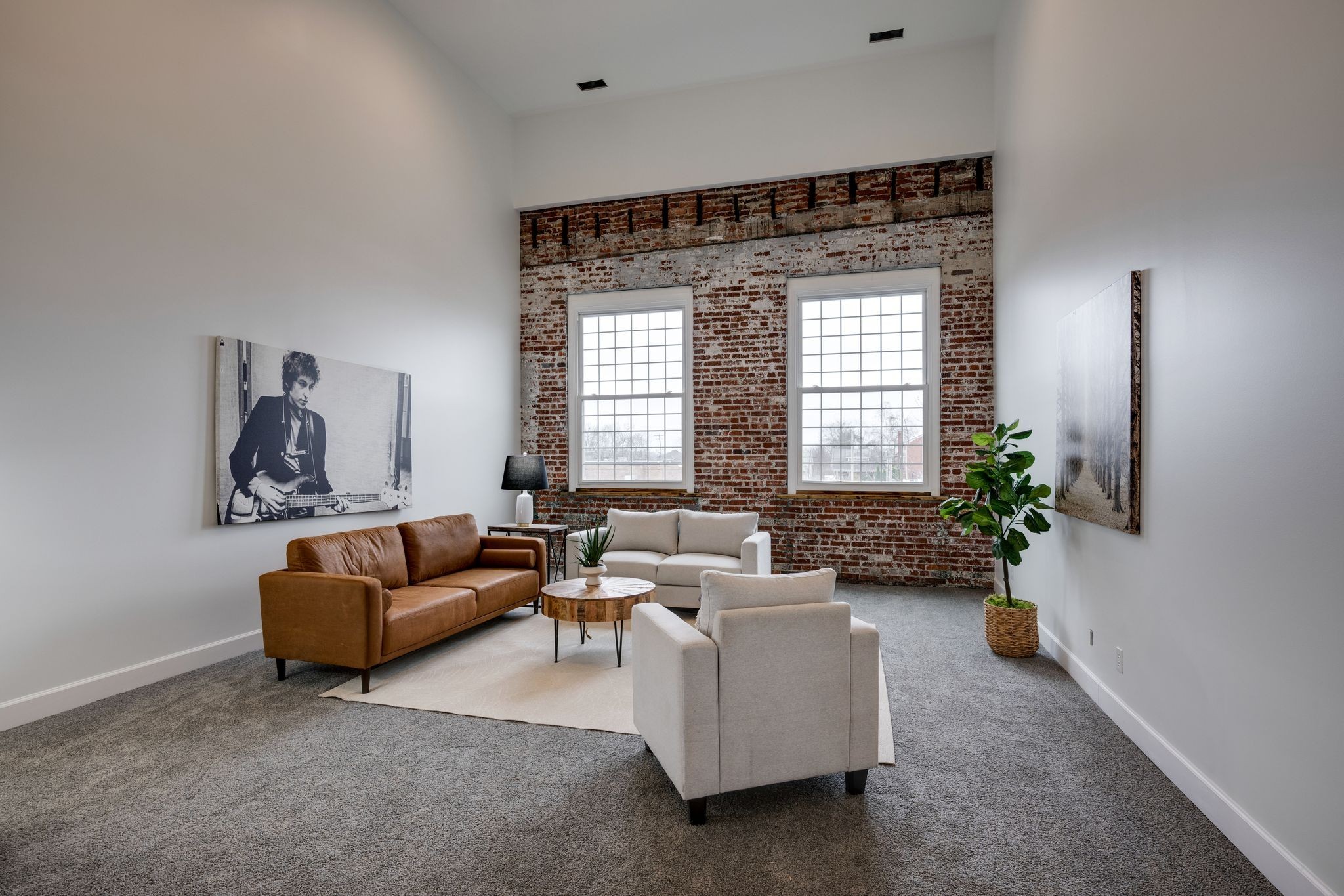 202 West College Street, Unit 4 Dickson, TN 37055 - Photo 3 of 40 a living room with furniture and a large window