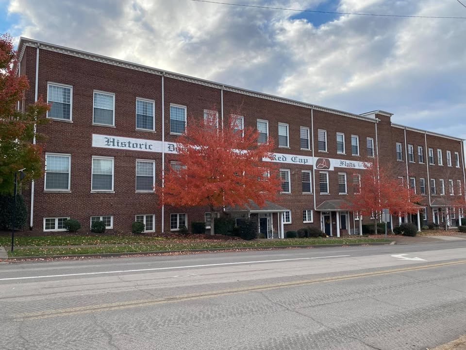 202 West College Street, Unit 4 Dickson, TN 37055 - Photo 37 of 40 a front view of a building with a garden