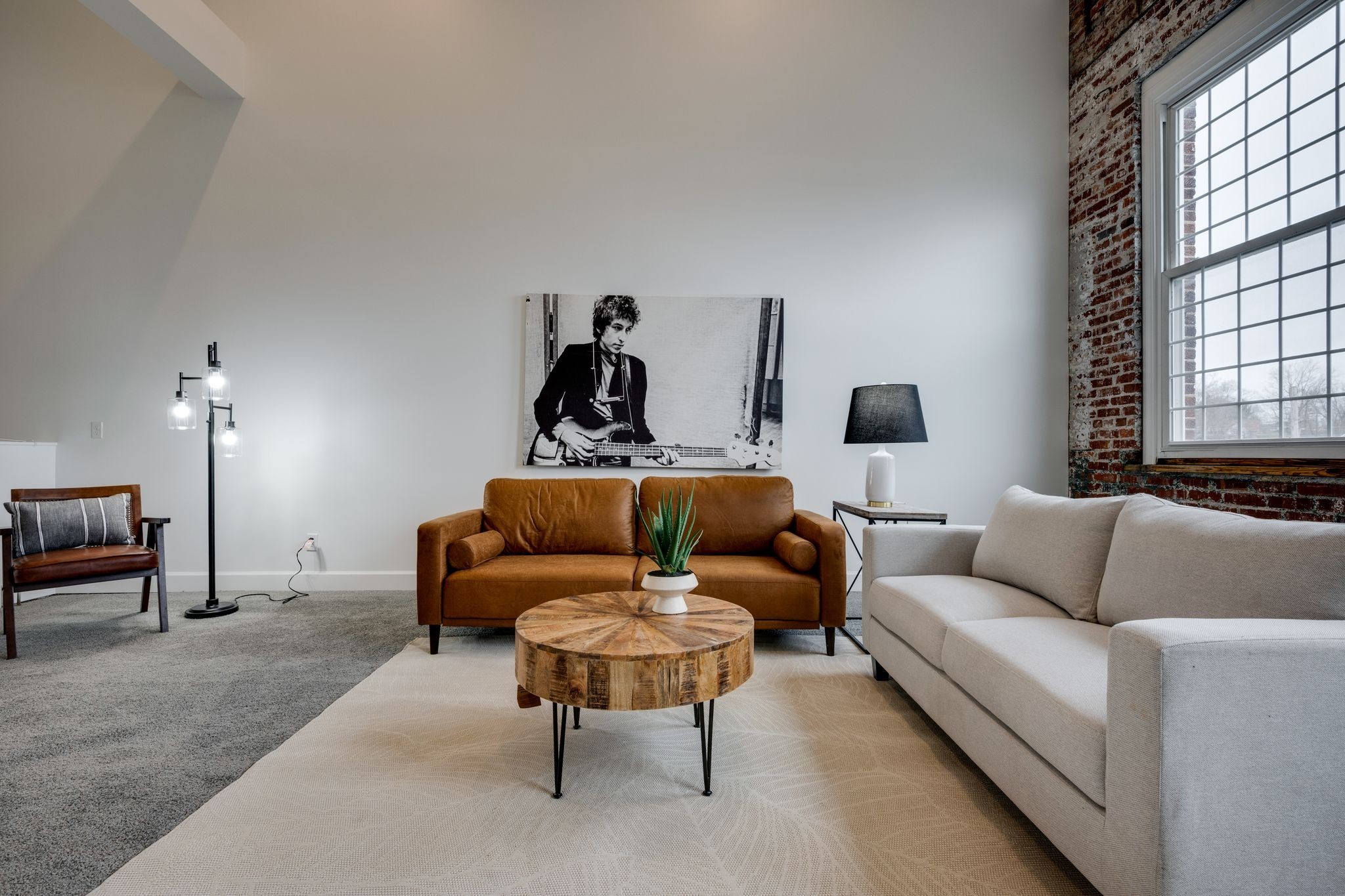 202 West College Street, Unit 4 Dickson, TN 37055 - Photo 4 of 40 a living room with furniture and a window