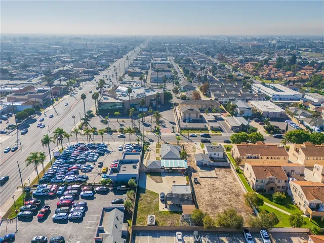 an aerial view of a house with a swimming pool