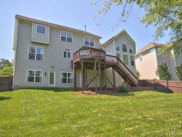 1817 Wescott Drive Raleigh, NC 27614 - Photo 24 of 25 Home features a great large fenced in yard and good size deck that is perfect for grilling out! Exterior Back