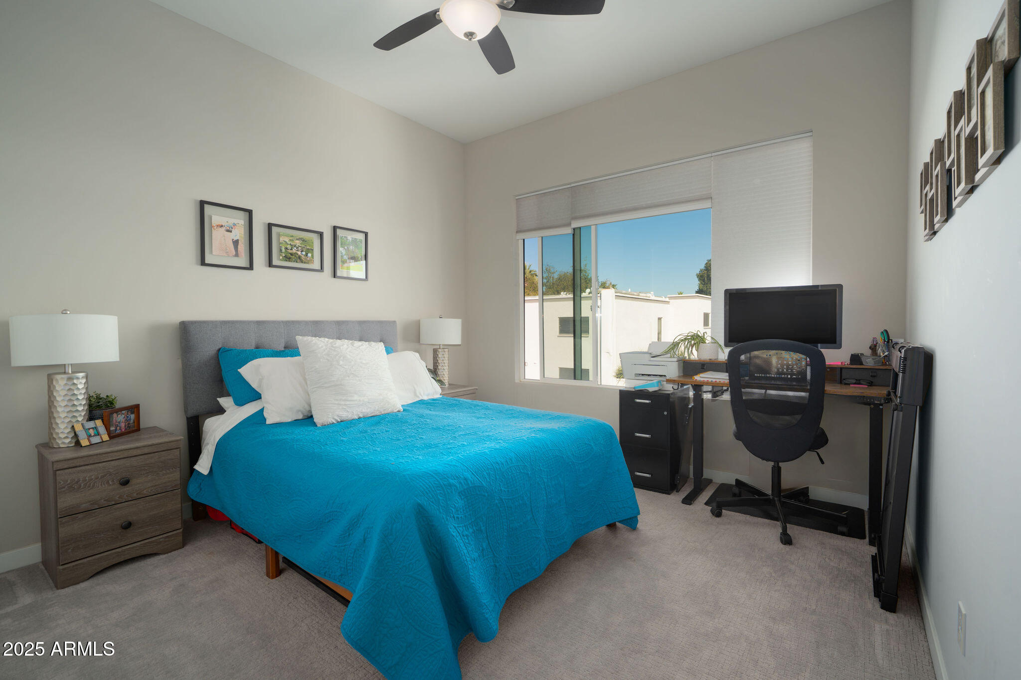 6301 North 12th Street, Unit 6 Phoenix, AZ 85014 - Photo 16 of 18 a bedroom with a bed and furniture