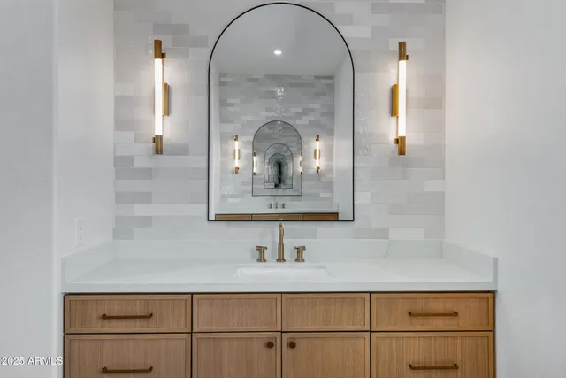 a room with a cabinet and a window