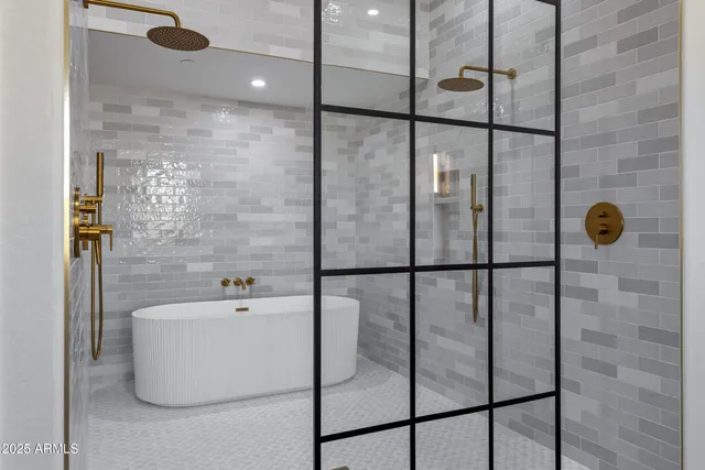 a utility room with sink dryer and washer