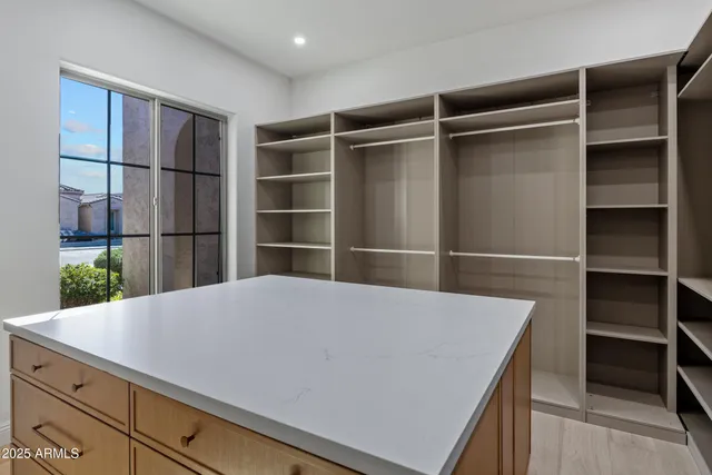 an aerial view of a house with a lake view