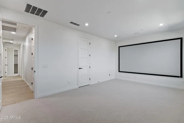 a front view of a house with sitting area