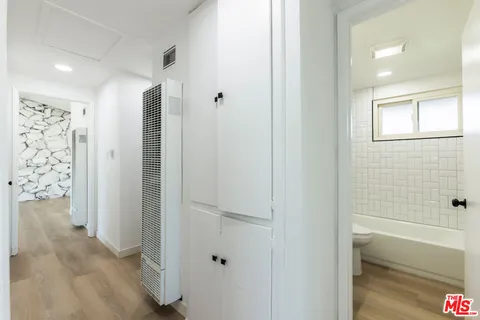 a bathroom with a shower and a tub