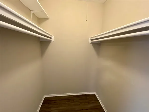 a view of small space with racks on the wall