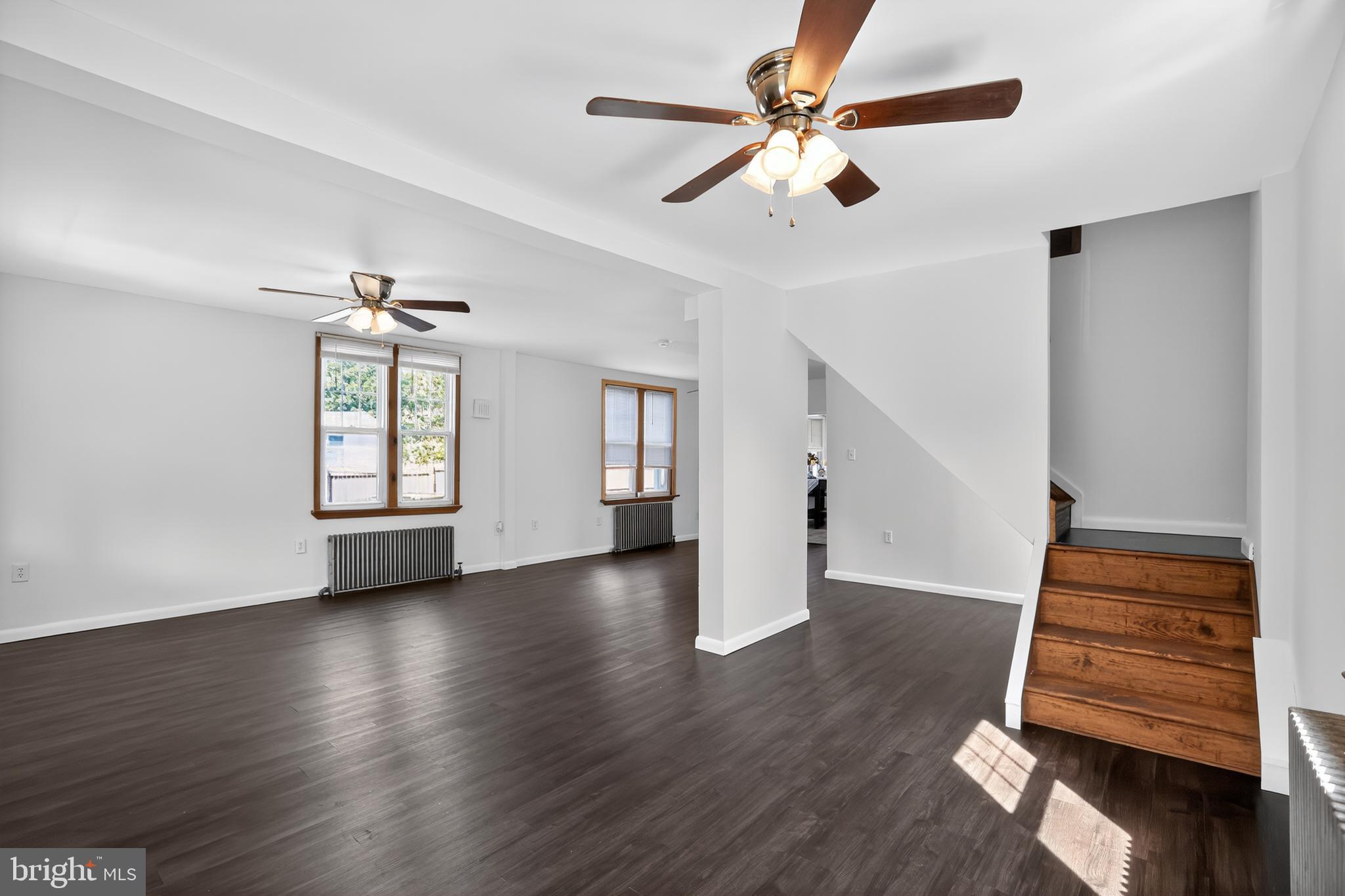 1079 Riverside Drive Pottstown, PA 19465 - Photo 13 of 37 Side view of living room with staircase to upstair