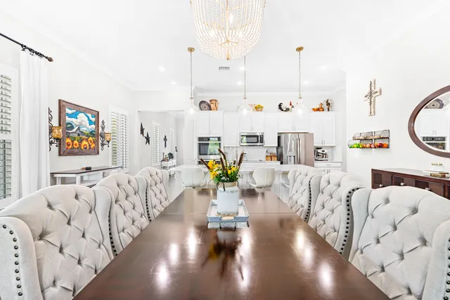 a bathroom with a double vanity sink mirror and shower