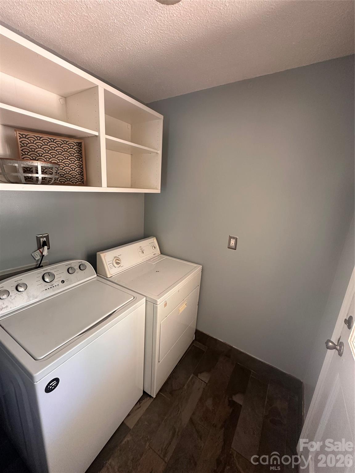 8004 Idlewild Road Indian Trail, NC 28079 - Photo 17 of 33 a utility room with dryer and washer