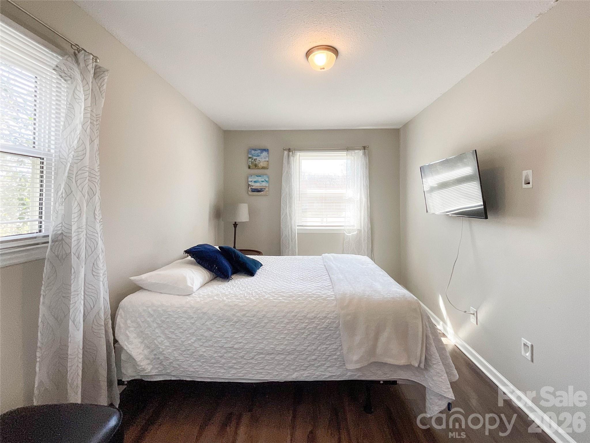 8004 Idlewild Road Indian Trail, NC 28079 - Photo 27 of 33 a bedroom with a bed and a window